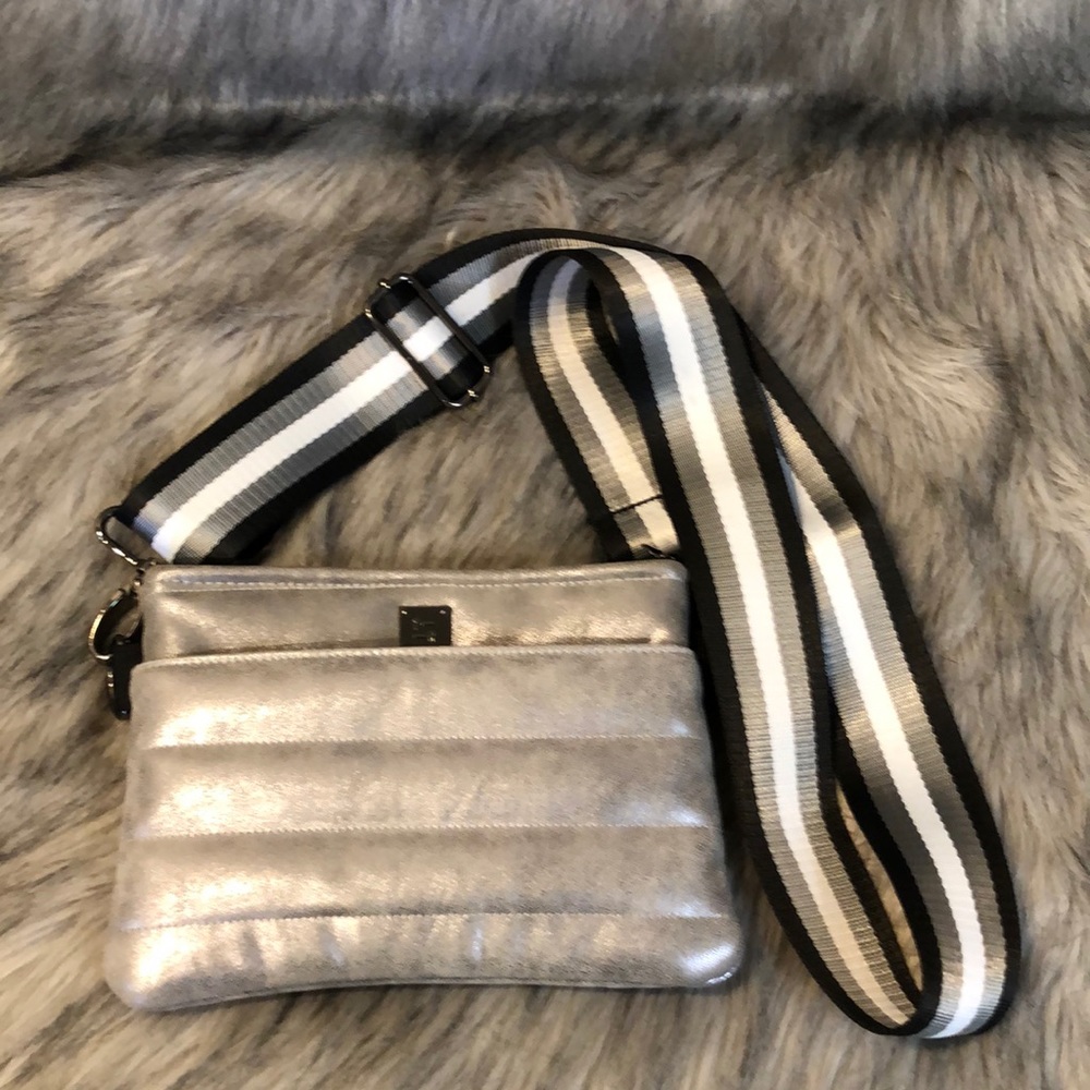 THINK ROYLN Silver Crossbody Bag with Black and White Strap